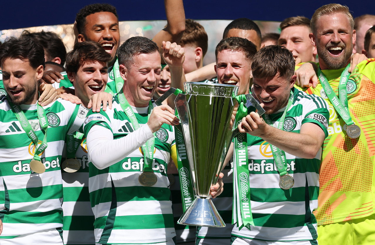 Callum McGregor and James Forrest of Celtic lift the League trophy