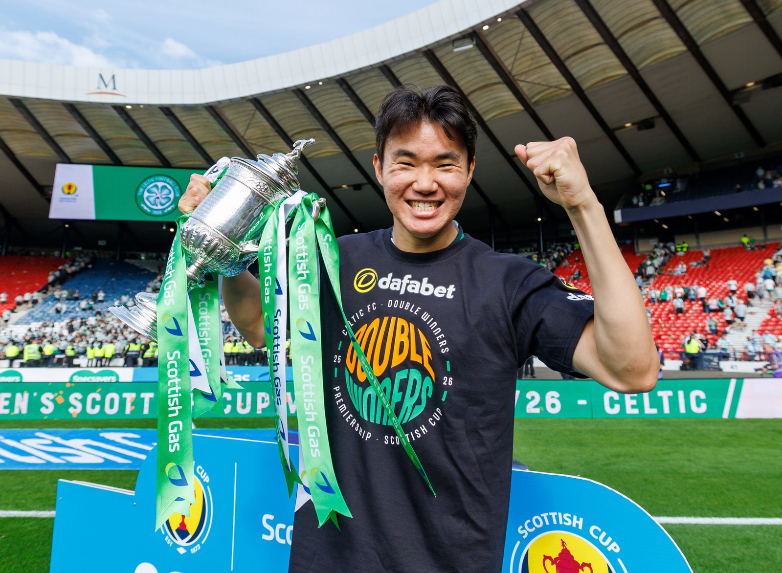 Yang lifts the Scottish Cup