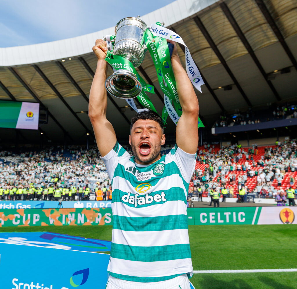 Alex Oxlaide Chamberlain lifts the Scottish Cup.