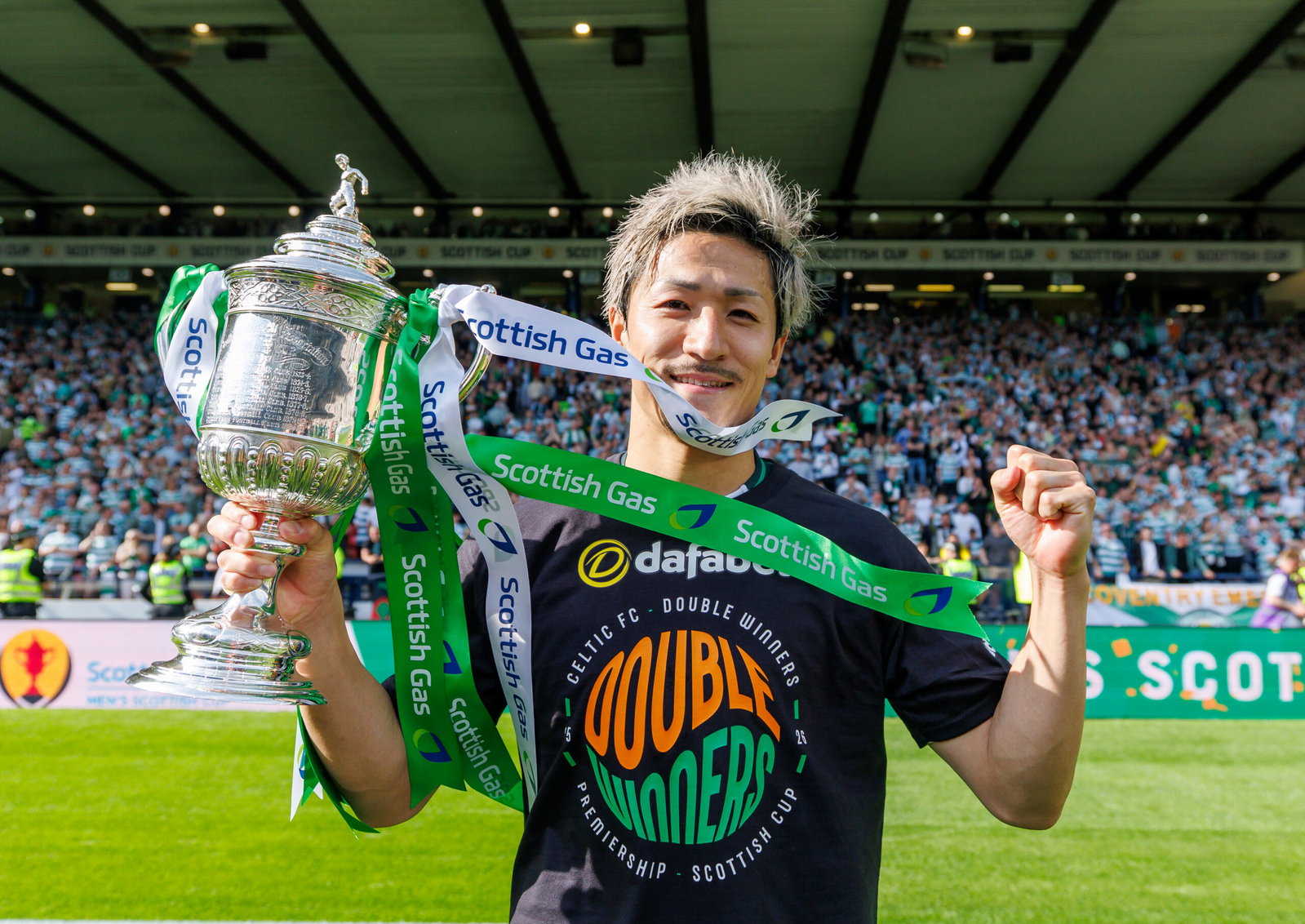 Daizen Maeda with the Scottish Cup.