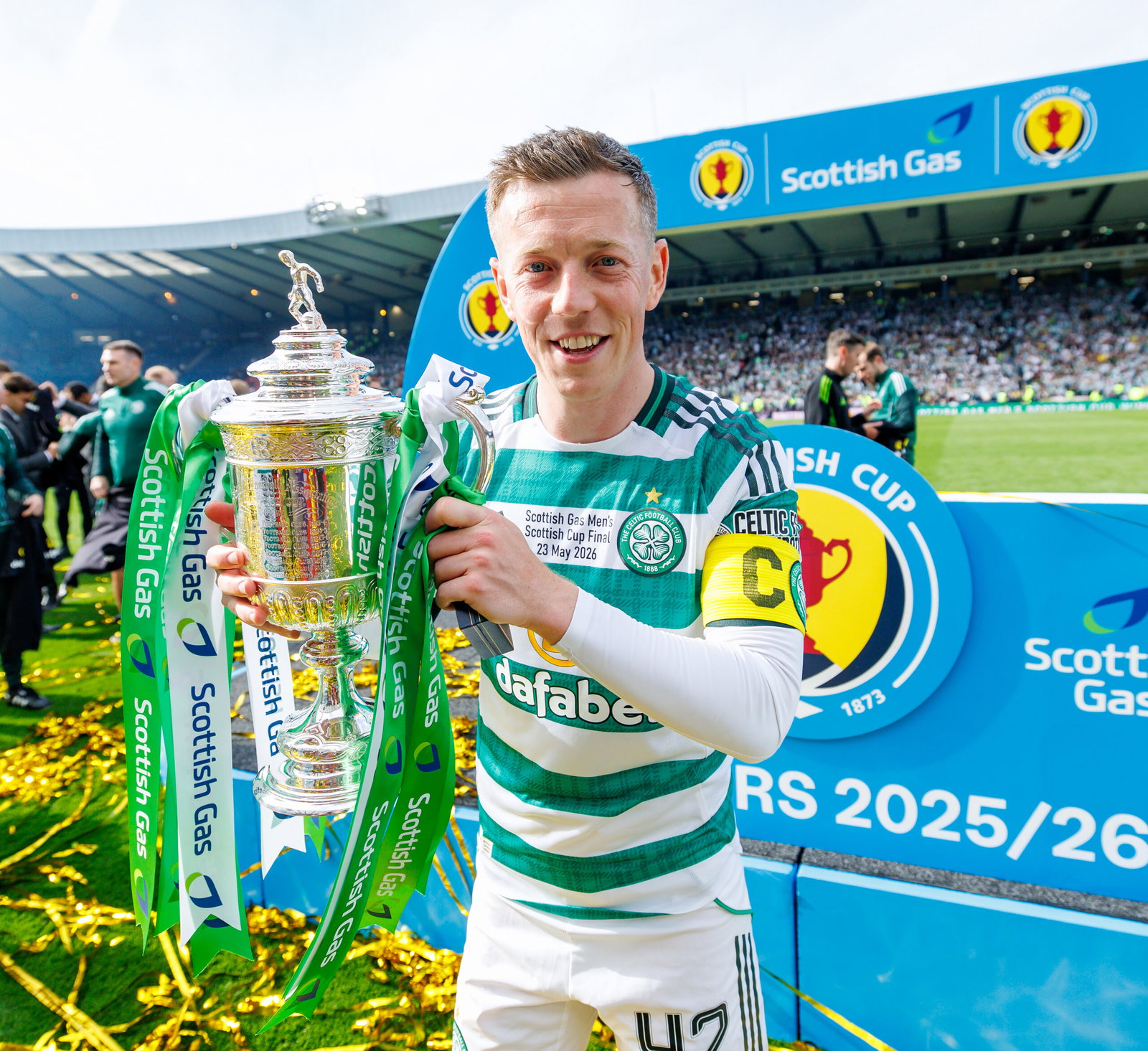 Callum McGregor lifts the Scottish Cup