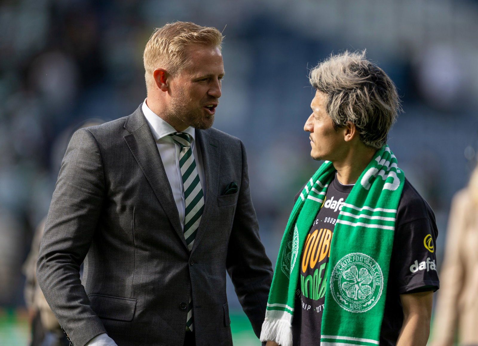 Daizen Maeda and Kasper Schmeichel chatting