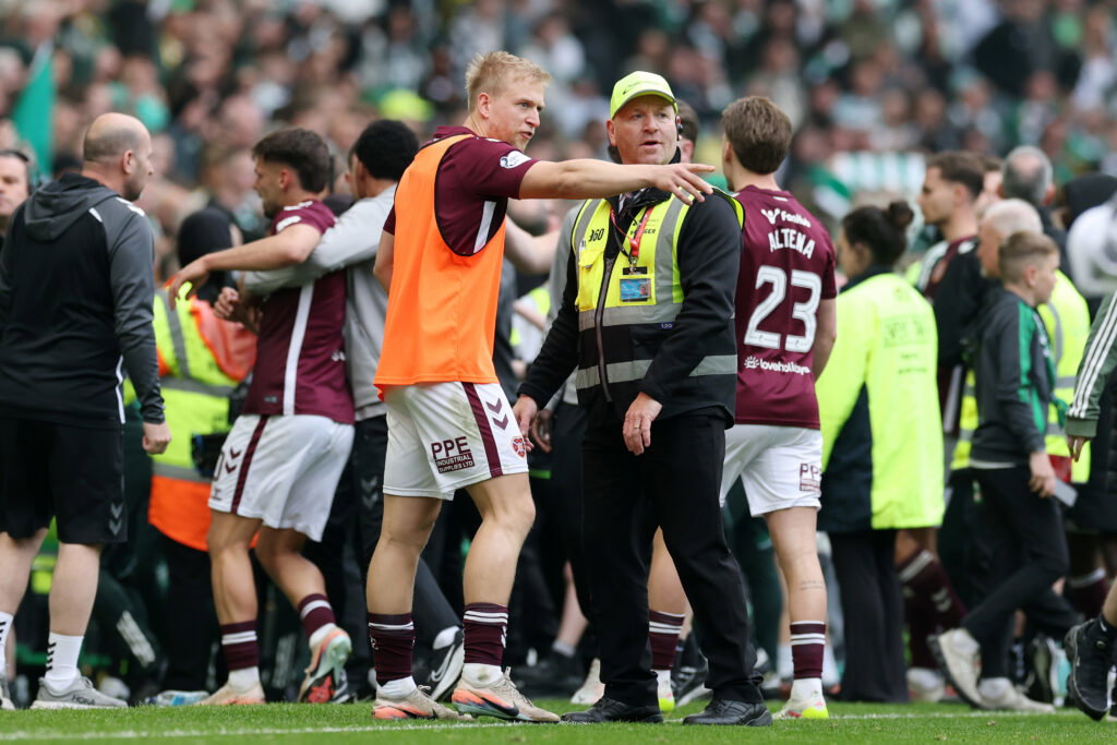 Hearts players having just lost the title.