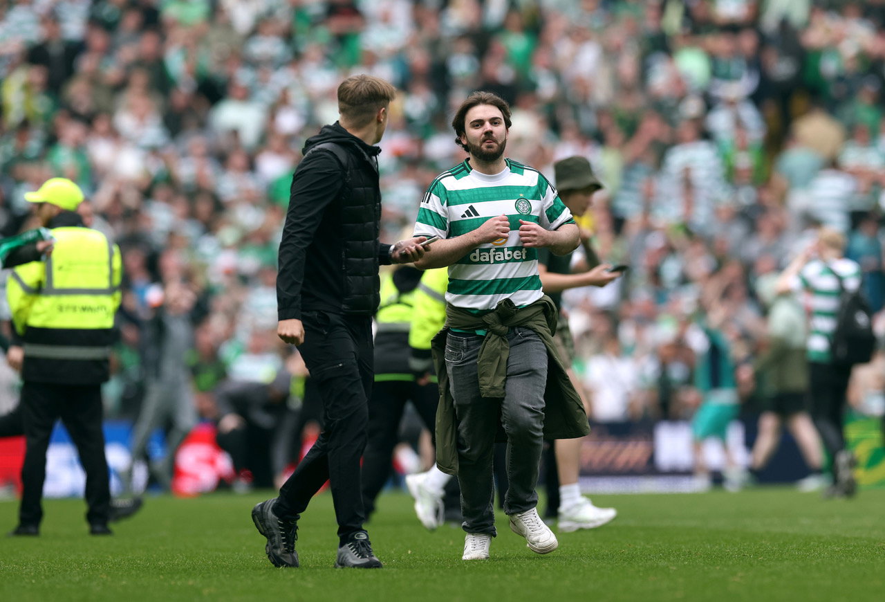 Celtic fans invade the pitch