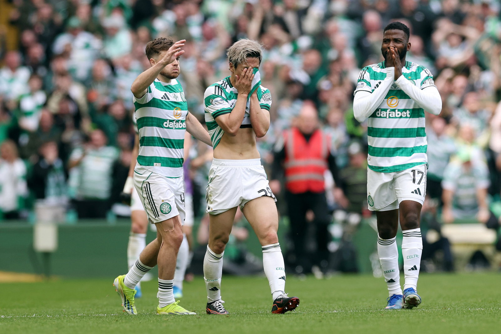 Daizen Maeda, James Forrest and Kelechi Iheanacho celebrate.