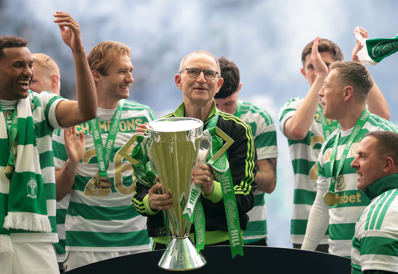Martin O'Neill, Manager of Celtic lifts the Scottish Premiership trophy
