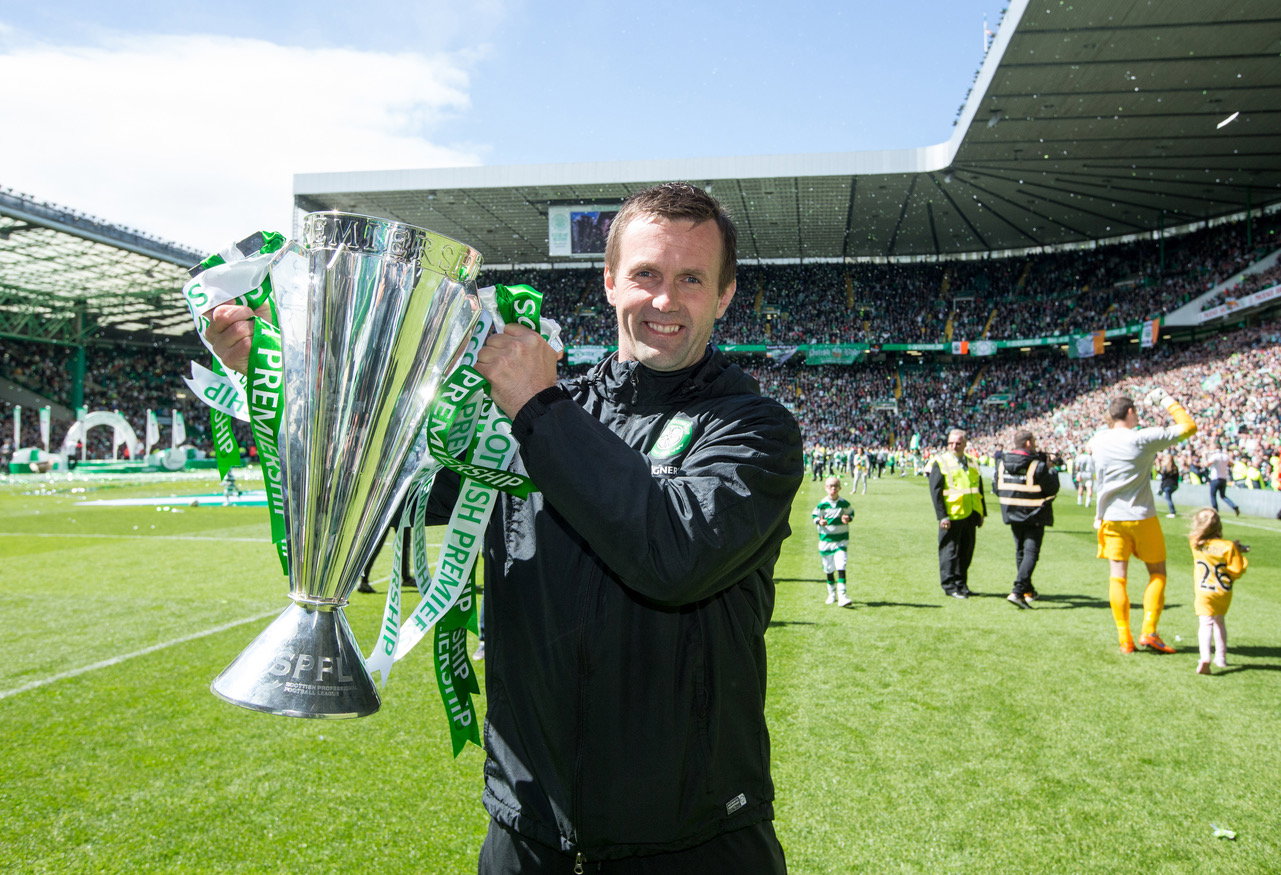 Celtic manager Ronny Deila lifts the trophy