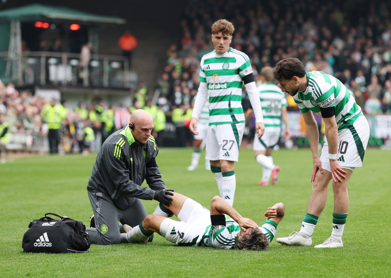 Jota of Celtic receives treatment 