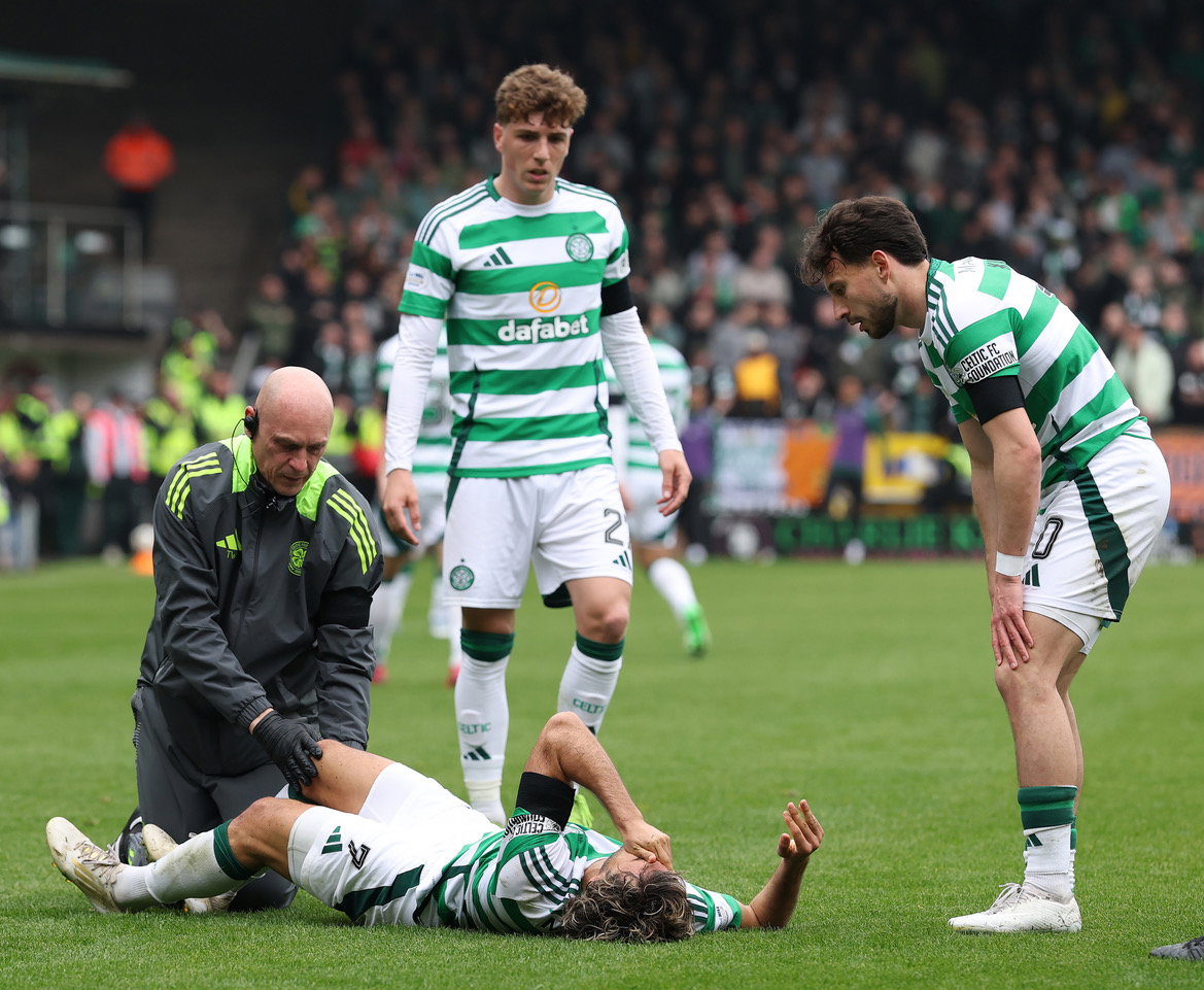 Jota of Celtic receives treatment 