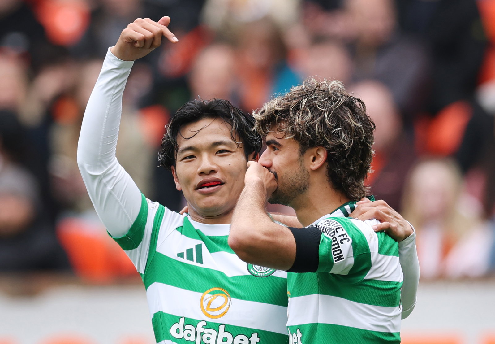 Jota of Celtic celebrates