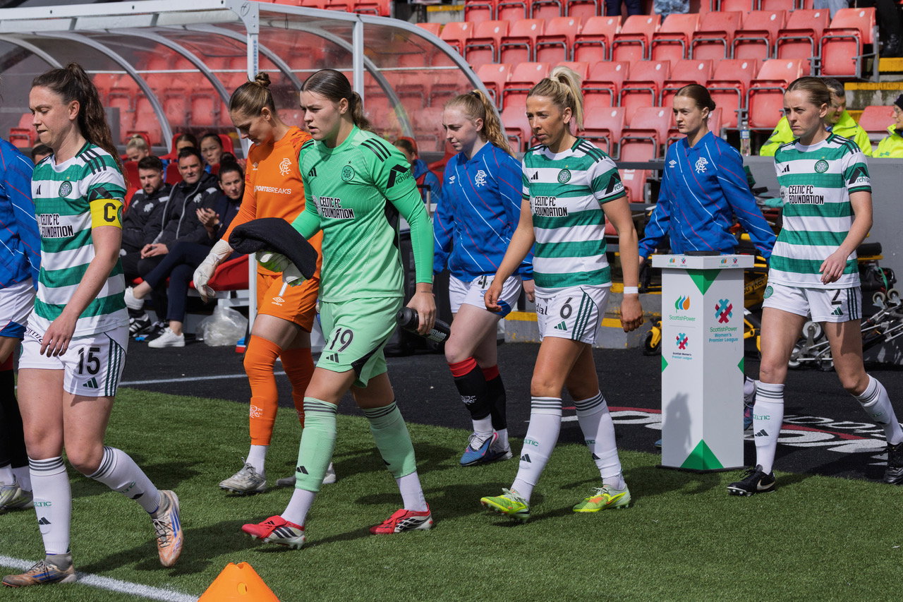 The teams come out at Broadwood for the Glasgow Derby.