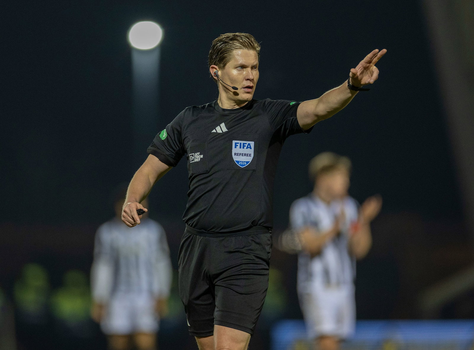 Referee David Dickinson 