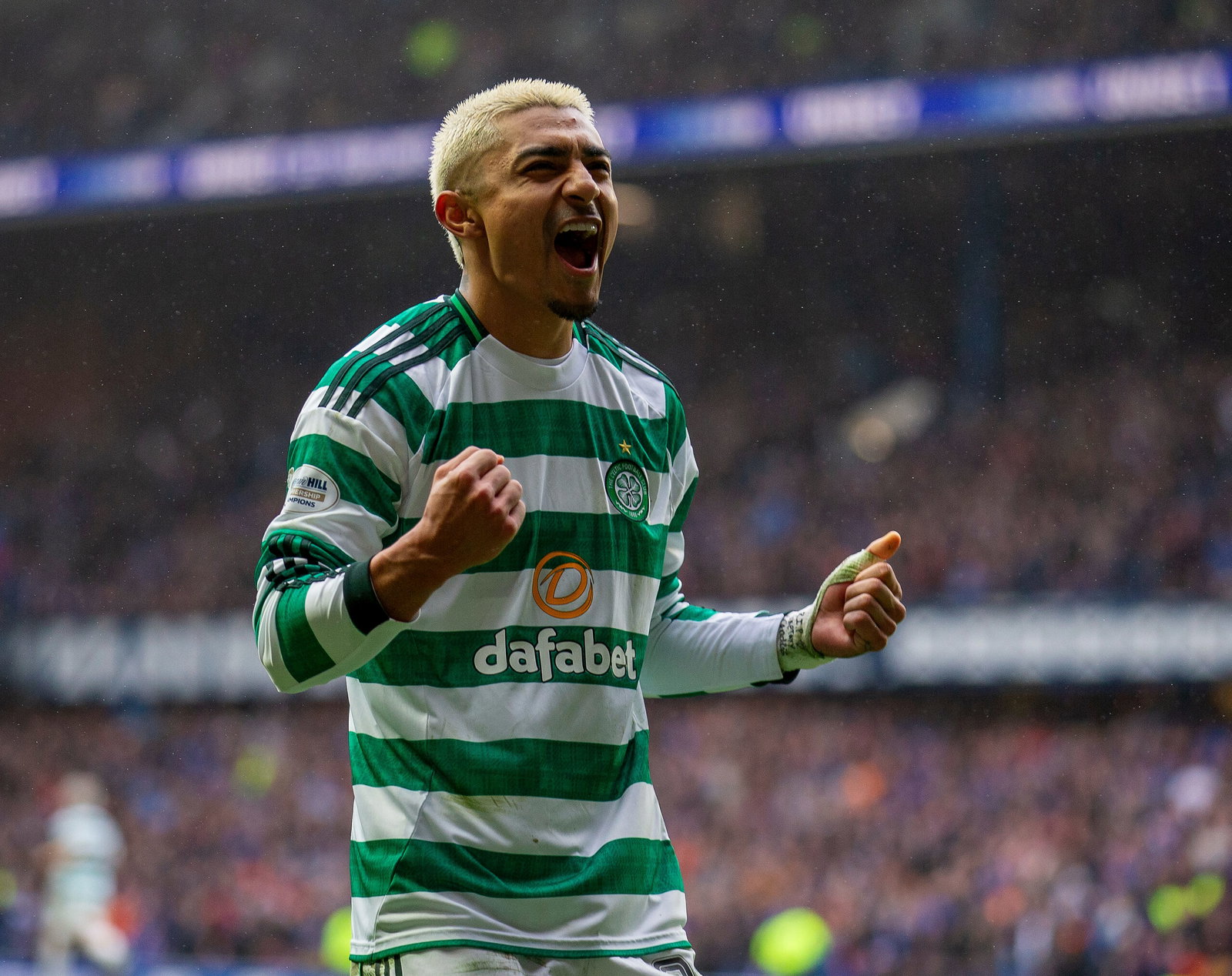 Julian Araujo of Celtic celebrates at Ibrox