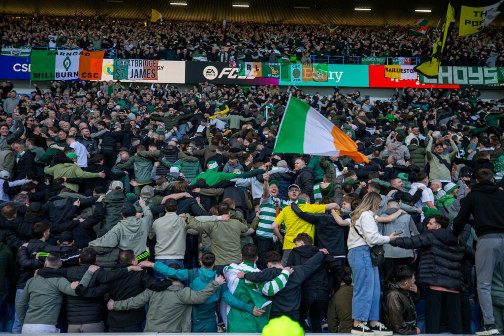 Celtic fans enjoying themselves at Ibrox