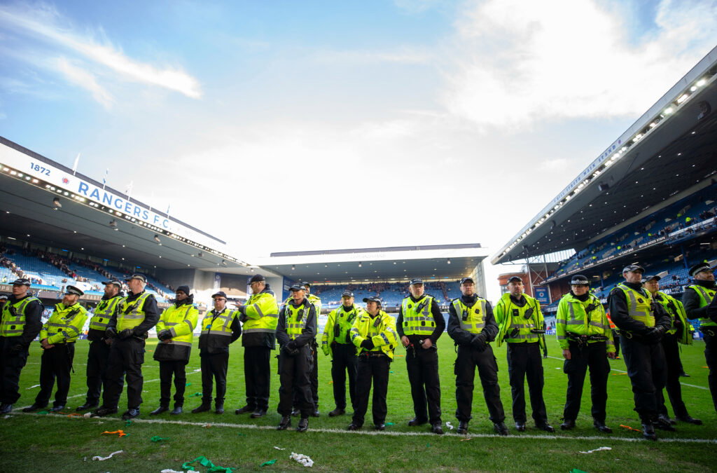 Police and stewards at Ibrox