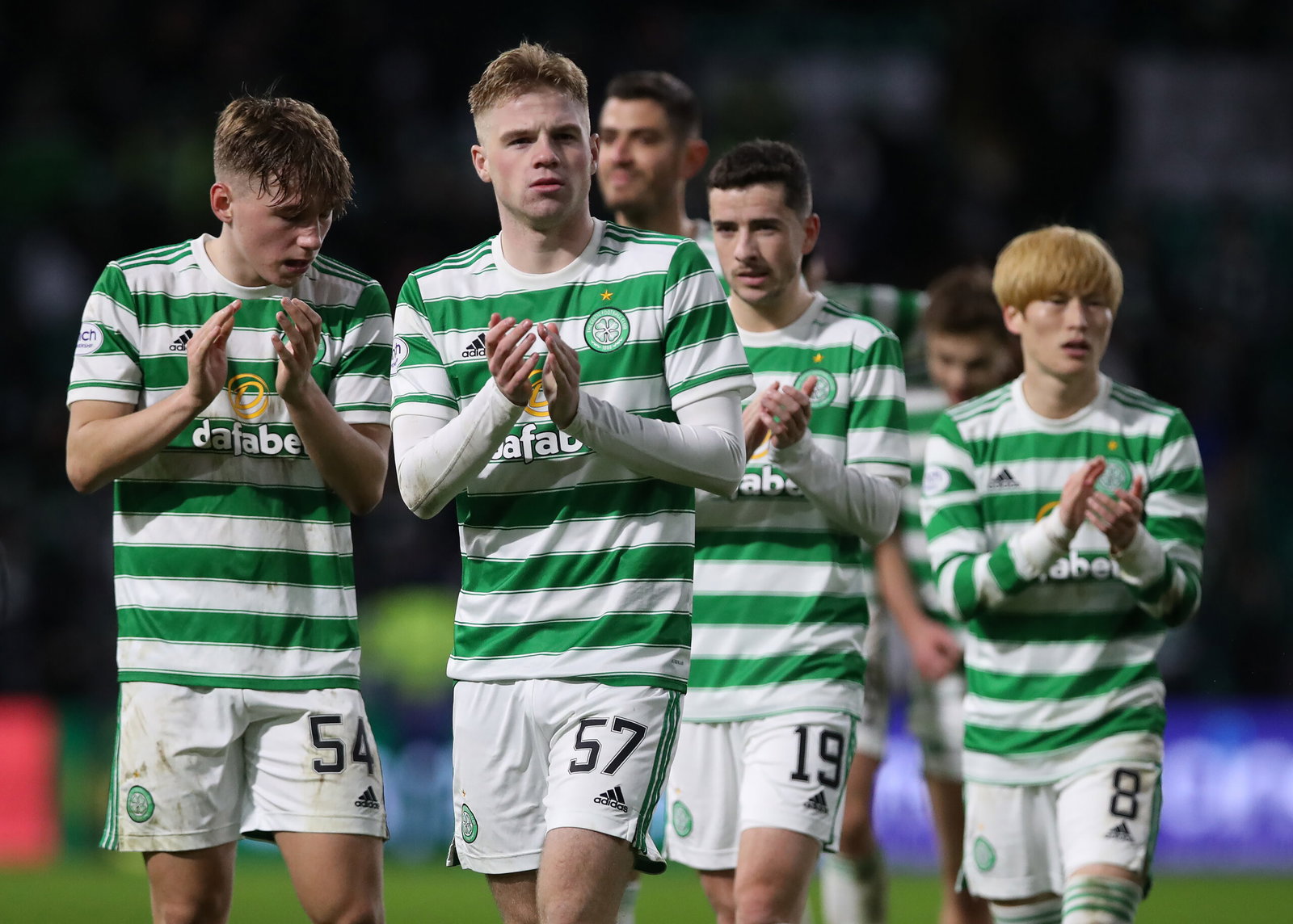 Stephen Welsh of Celtic applauds the fans 