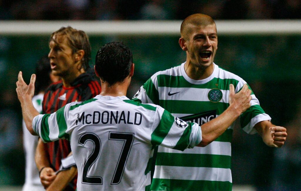 Scott McDonald of Celtic celebrates with Massimo Donati