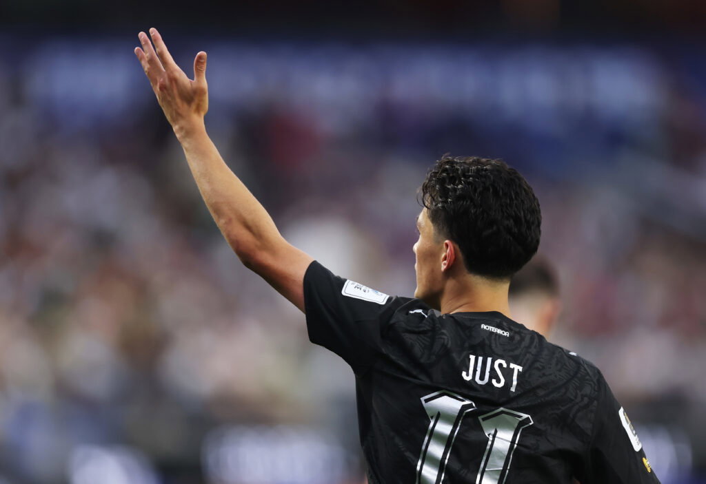 Elijah Just of New Zealand celebrates scoring his team's second goal