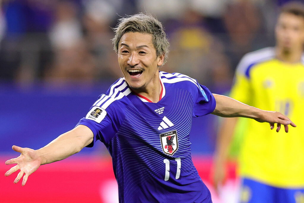 Daizen Maeda of Japan celebrates