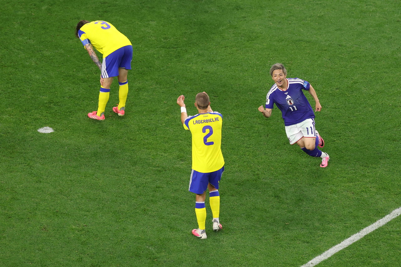 Daizen Maeda of Japan celebrates 