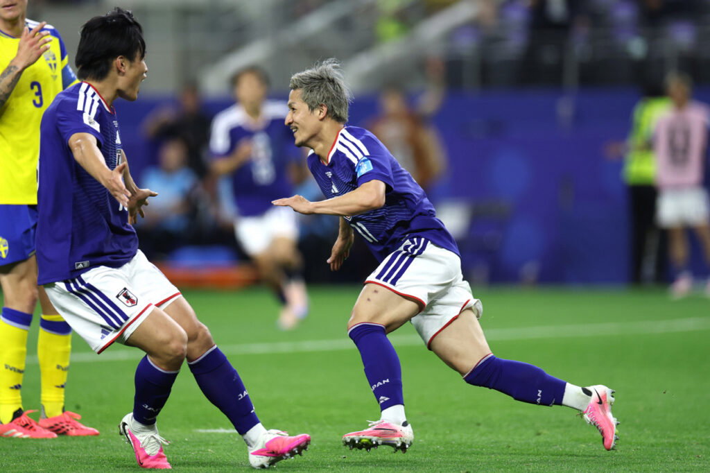 Daizen Maeda of Japan celebrates