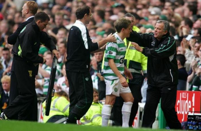 Celtic’s Juninho is congratulated by manager Martin O’Neill