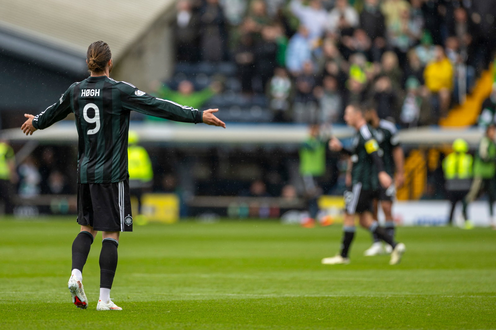 Kasper Hogh of Celtic celebrates after he scores with a header to make it 3-0