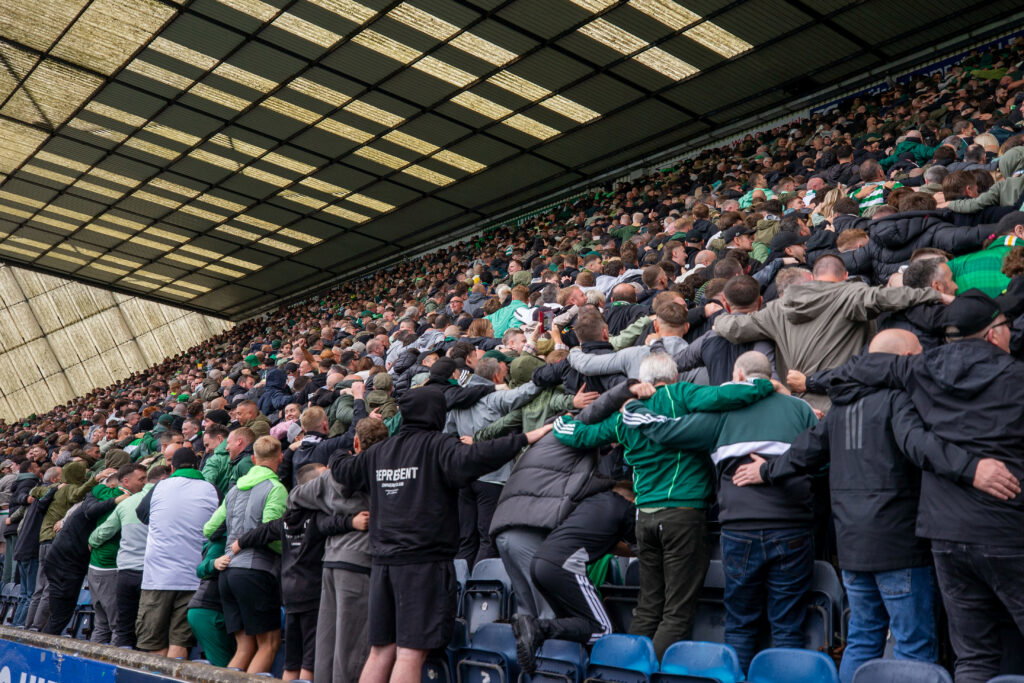Celtic finally acting like a proper football club Celtic fans doing the Huddle at Rugby Park