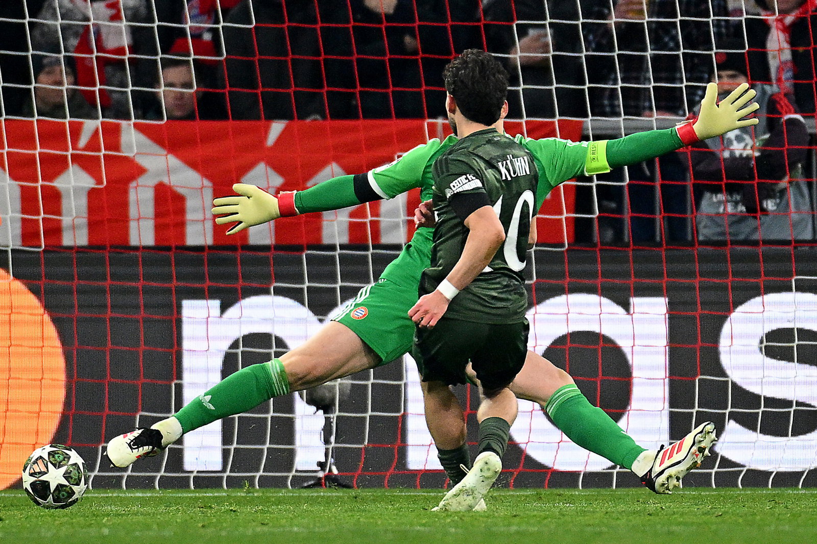 Nicolas Kohn of Celtic scores past Manuel Neuer of Bayern Munich