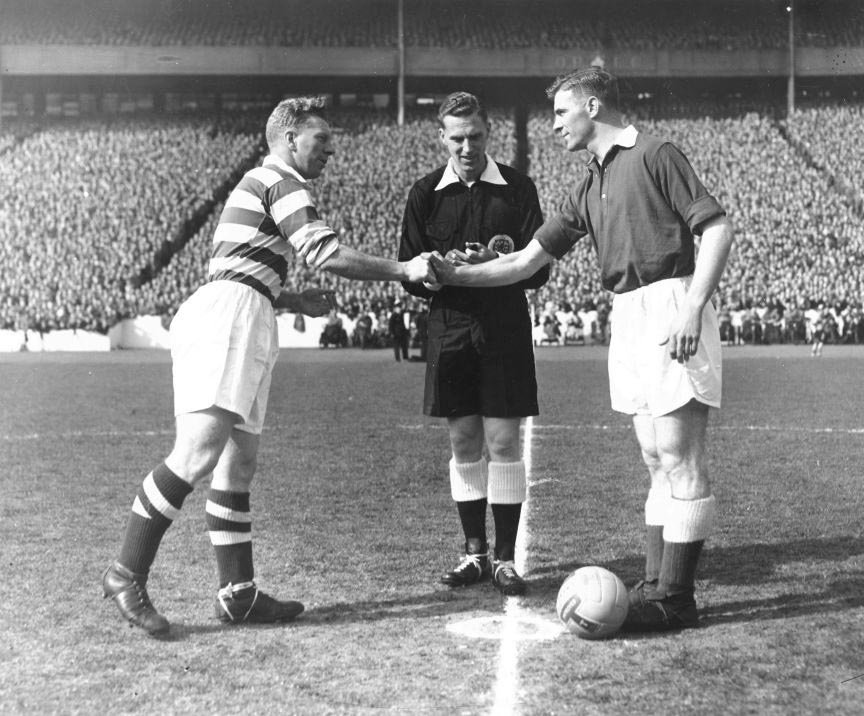 Hearts’ Freddie Glidden shakes hands with Celtic’s Bobby Evans before the Hearts v Celtic Scottish Cup Final at Hampden in April 1956.