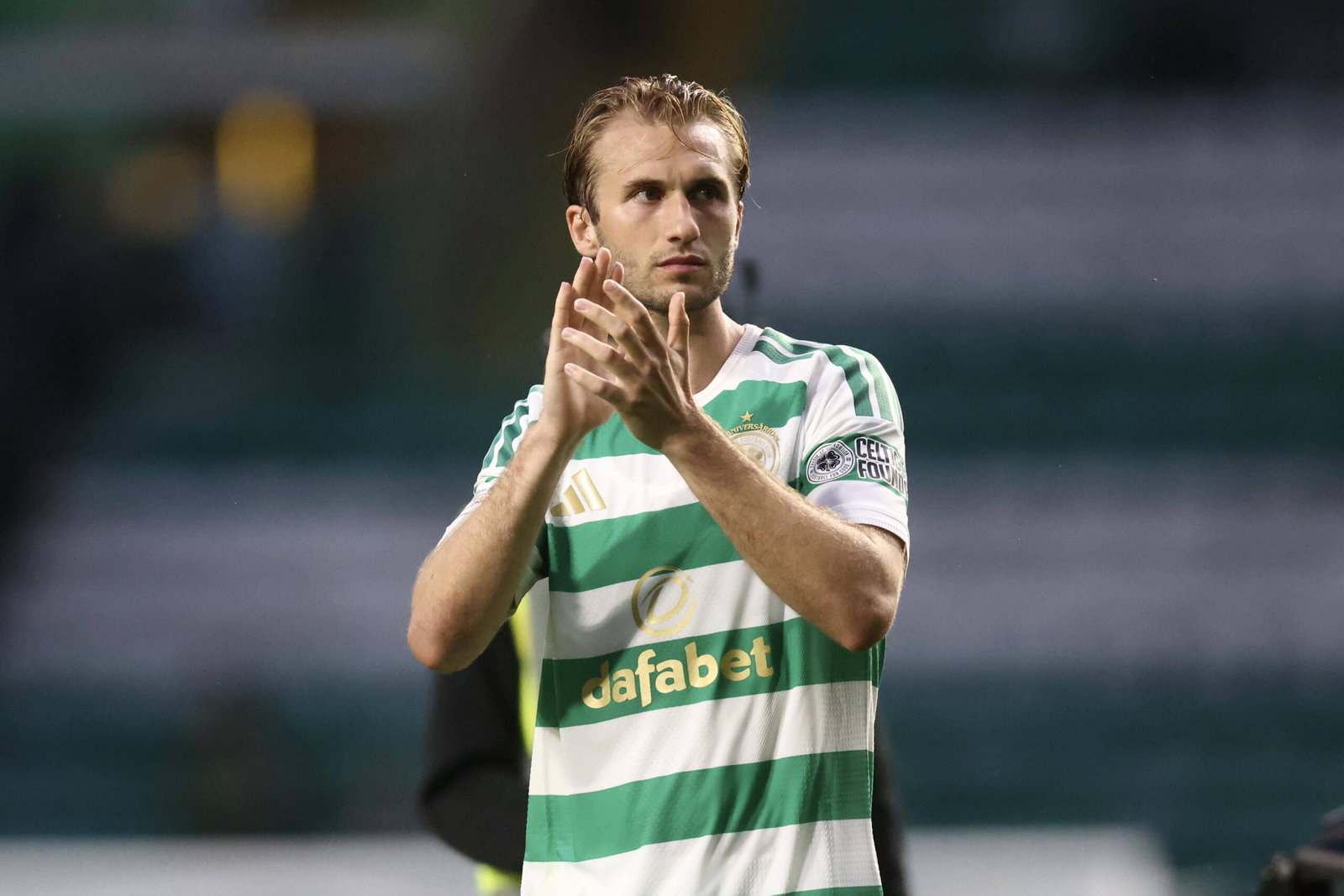 Benjamin Nygren applauds the fans