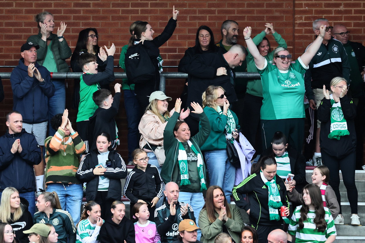 Celtic supporters celebrate the win at the final whistle