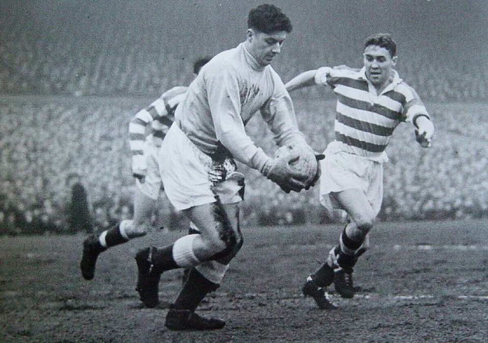 Bobby Collins keeps his eye on the ball at Celtic Park 