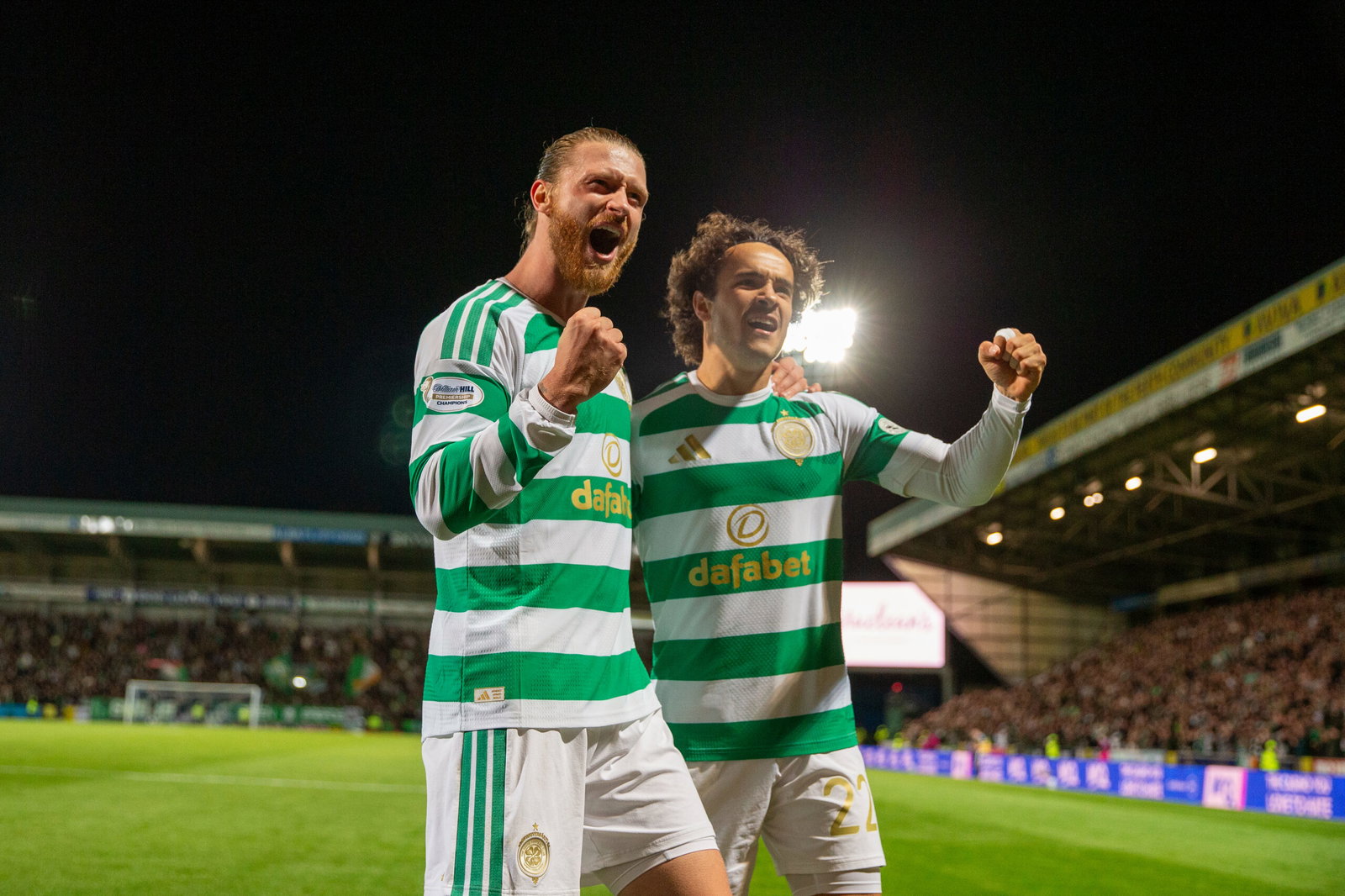 Mika Baur celebrates his first Celtic goal with Kasper Hogh