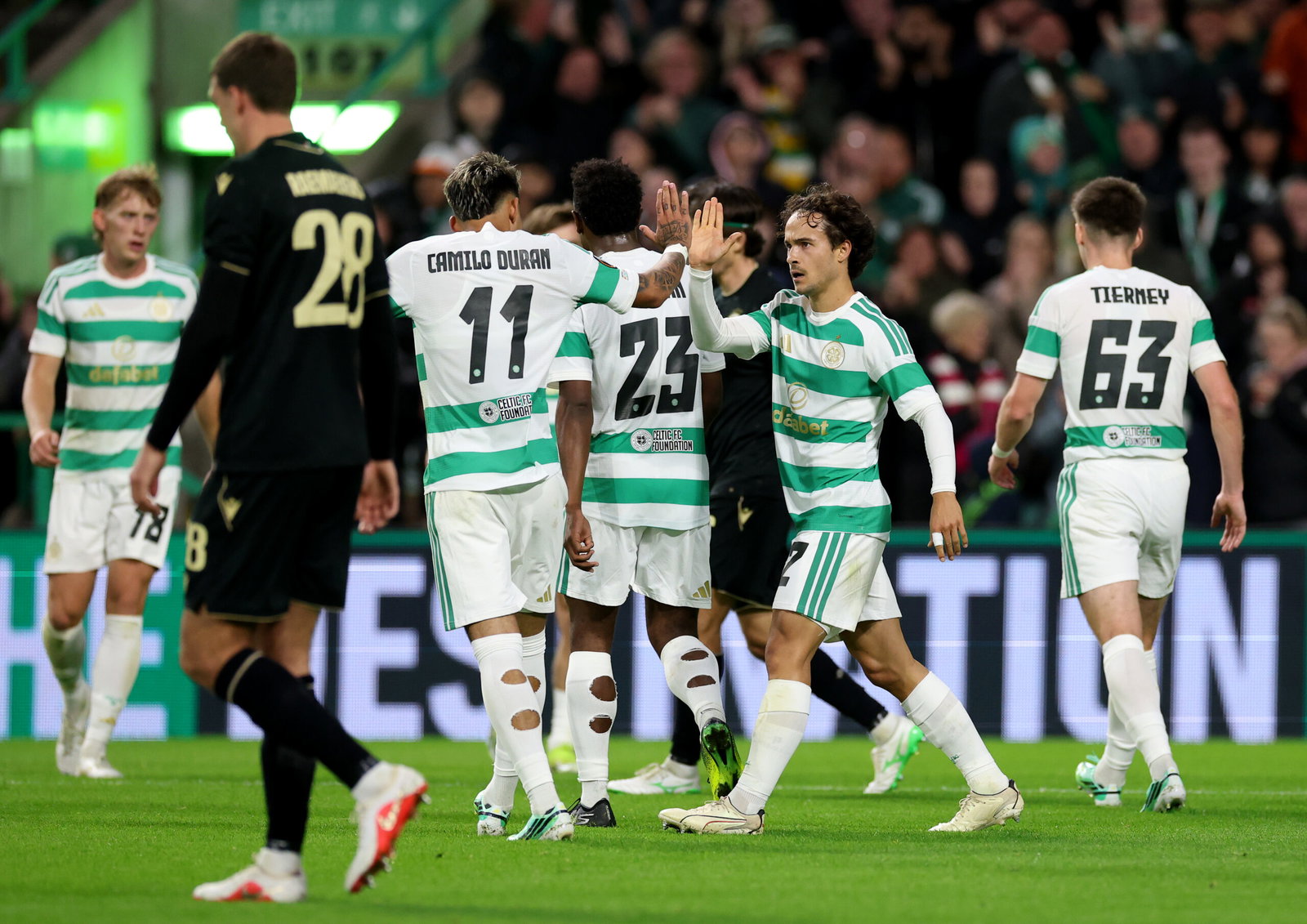 Mika Baur of Celtic celebrates