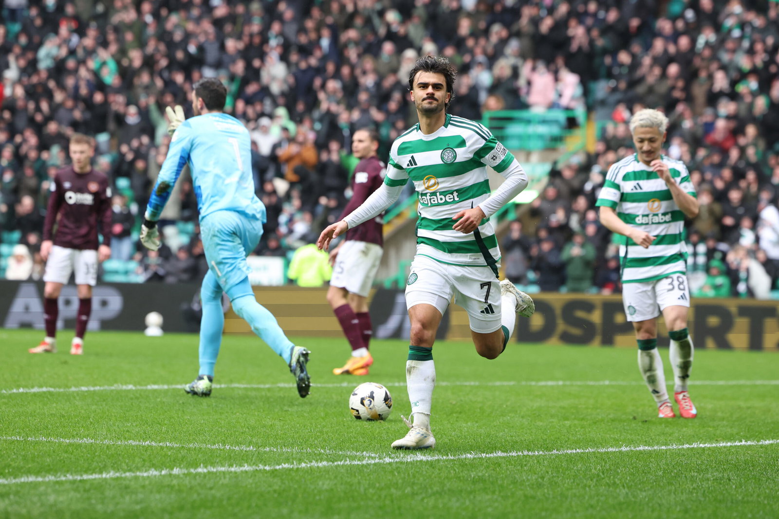 Jota of Celtic celebrates