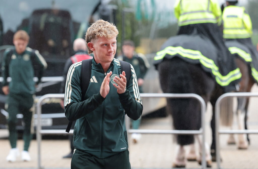 Oliver Sørensen of Celtic applauds the fans