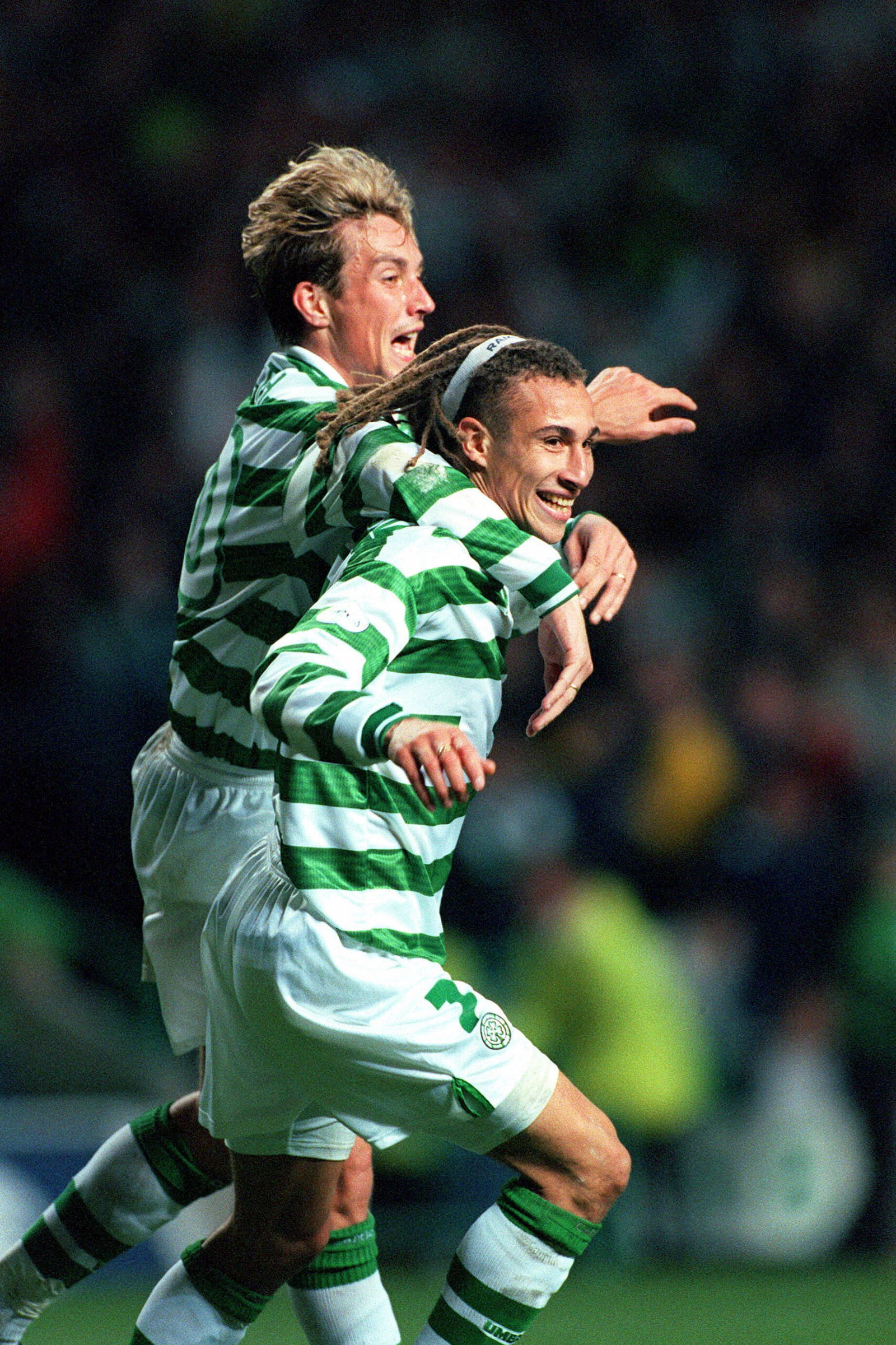 Henrik Larsson and  Vidar Riseth celebrate. 
