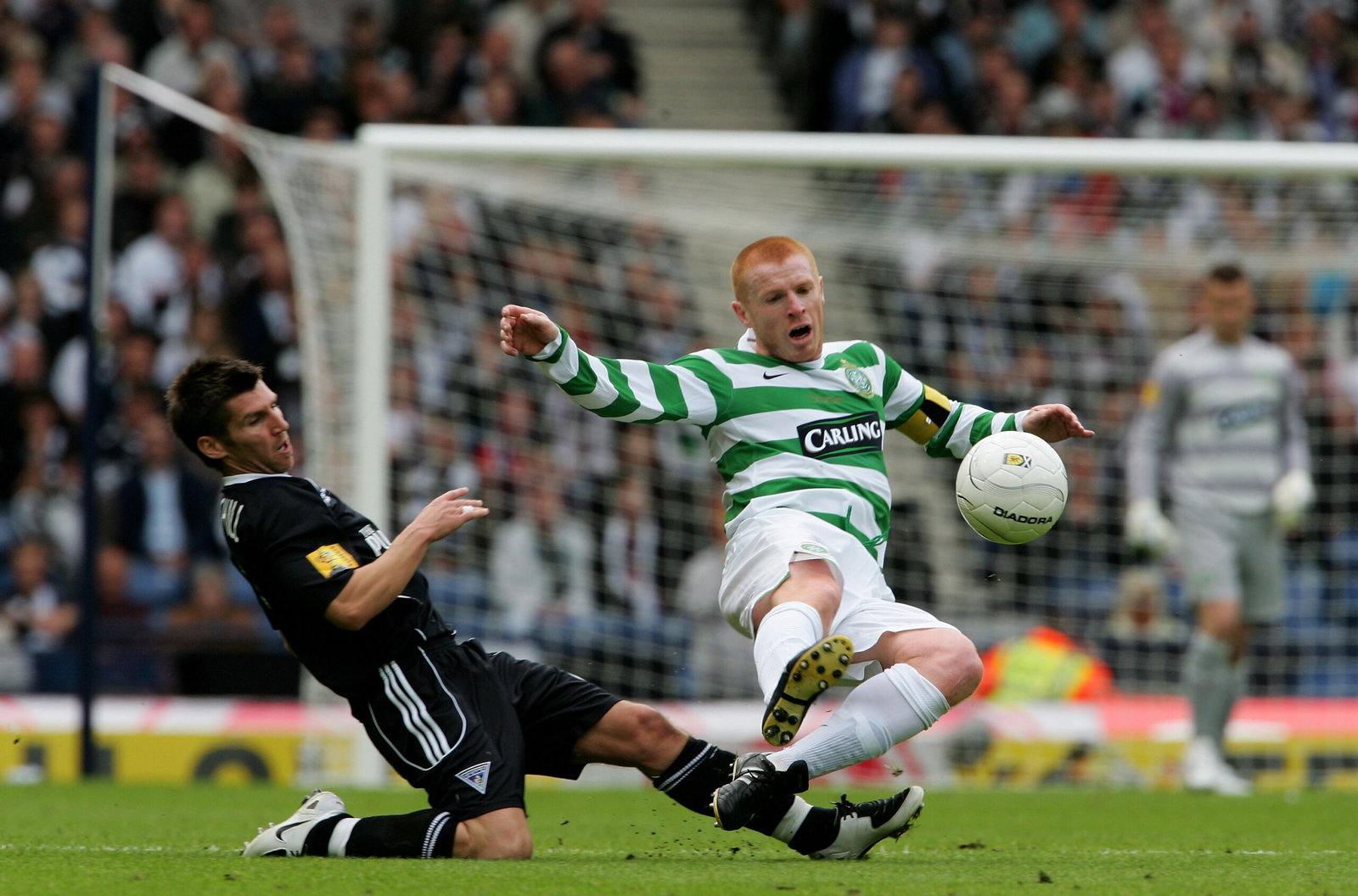 Mark Burchill tackles Neil Lennon